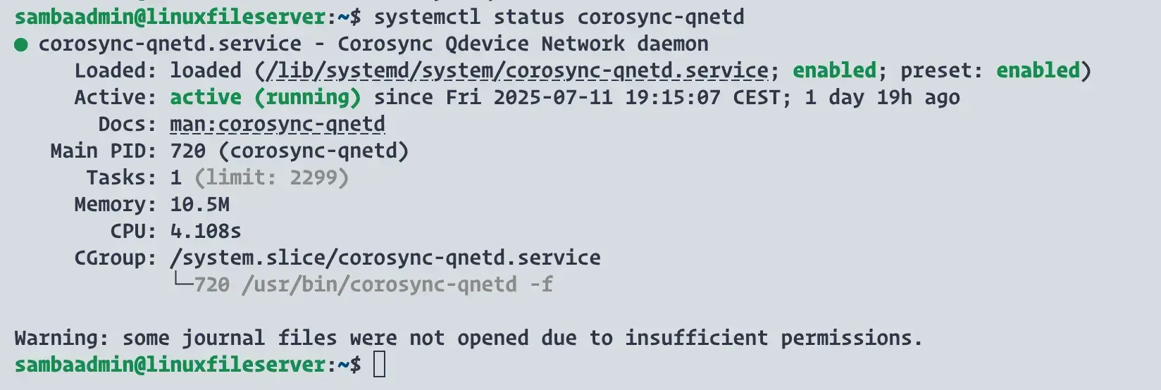Terminal output on a Debian 12 VM showing that the corosync-qnetd service is active and enabled, confirming the QDevice is running.